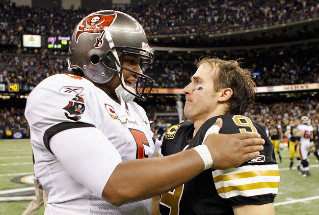 NEW ORLEANS, LA - NOVEMBER 06:  Josh Freeman #5 of the Tampa Bay Buccaneers congratulates Drew Brees #9 of the New Orleans Saints after their game at Mercedes-Benz Superdome on November 6, 2011 in New Orleans, Louisiana.  (Photo by Streeter Lecka/Getty Images)
