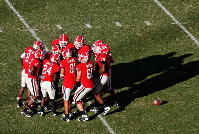 ATHENS, GA - OCTOBER 03:  Quarterback Joe Cox #14 and the Georgia Bulldogs offense against the Louisiana State University Tigers at Sanford Stadium on October 3, 2009 in Athens, Georgia.  (Photo by Kevin C. Cox/Getty Images)