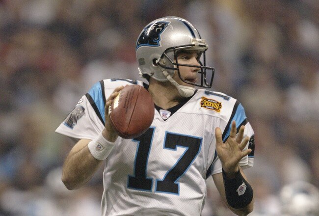 HOUSTON - FEBRUARY 1:  Quarterback Jake Delhomme #17 of the Carolina Panthers drops back to pass the ball against the New England Patriots during Super Bowl XXXVIII at Reliant Stadium on February 1, 2004 in Houston, Texas.  The Patriots defeated the Panthers 32-29.  (Photo by Brian Bahr/Getty Images)
