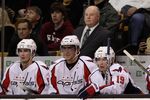 BOSTON - OCTOBER 21:  Head coach Bruce Boudreau of the Washington Capitals and (l-r) Marcus Johansson #90, Alex Ovechkin #8 and Nicklas Backstrom #19 look on from the bench against the Boston Bruins at the TD Garden on October 21, 2010 in Boston, Massachusetts.  The Bruins won 4-1.  (Photo by Bruce Bennett/Getty Images)