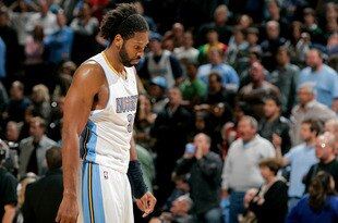 DENVER, CO - APRIL 23:  Nene #31 of the Denver Nuggets walks off the court following a 97-94 loss to the Oklahoma City Thunder in Game Three of the Western Conference Quarterfinals in the 2011 NBA Playoffs at Pepsi Center on April 23, 2011 in Denver, Colorado. NOTE TO USER: User expressly acknowledges and agrees that, by downloading and or using this photograph, User is consenting to the terms and conditions of the Getty Images License Agreement.  (Photo by Justin Edmonds/Getty Images)