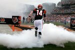 CINCINNATI, OH - NOVEMBER 27:  Andy Dalton #14 of the Cincinnati Bengals takes the field for the game against the Cleveland Browns at Paul Brown Stadium on November 27, 2011 in Cincinnati, Ohio.  The Bengals defeated the Browns 23-20.  (Photo by John Grieshop/Getty Images)