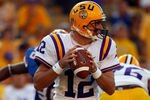 BATON ROUGE, LA - OCTOBER 08:  Jarrett Lee #12 of the Louisiana State University Tigers looks to throw a pass against the Florida Gators at Tiger Stadium on October 8, 2011 in Baton Rouge, Louisiana.  (Photo by Chris Graythen/Getty Images)