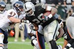 OAKLAND, CA - NOVEMBER 27:  Michael Bush #29 of the Oakland Raiders beats Chris Conte #47 of the Chicago Bears to the goal line for a three yard touchdown run in the fourth quarter at O.co Coliseum on November 27, 2011 in Oakland, California.  (Photo by Thearon W. Henderson/Getty Images)
