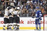 TORONTO, CANADA - NOVEMBER 5: Mike Brown #18 of the Toronto Maple Leafs looks on as the Boston Bruins celebrate a third period goal during NHL action at The Air Canada Centre November 5, 2011 in Toronto, Ontario, Canada. (Photo by Abelimages/Getty Images)