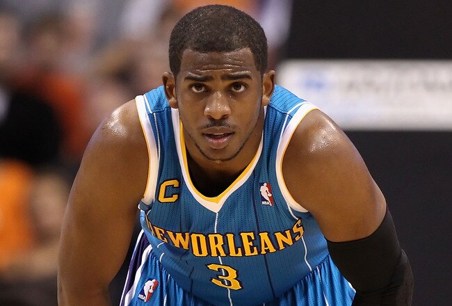 PHOENIX, AZ - JANUARY 30:  Chris Paul #3 of the New Orleans Hornets during the NBA game against  the Phoenix Suns at US Airways Center on January 30, 2011 in Phoenix, Arizona.  The Suns defeated the Hornets 104-102. NOTE TO USER: User expressly acknowledges and agrees that, by downloading and or using this photograph, User is consenting to the terms and conditions of the Getty Images License Agreement.  (Photo by Christian Petersen/Getty Images)
