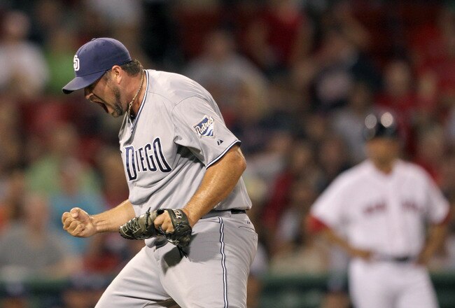 BOSTON, MA  - JUNE 21:  Heath Bell #21 of the San Diego Padres reacts in the ninth inning after a 5-4 win against the Boston Red Sox at Fenway Park on June 21, 2011 in Boston, Massachusetts.  (Photo by Jim Rogash/Getty Images)