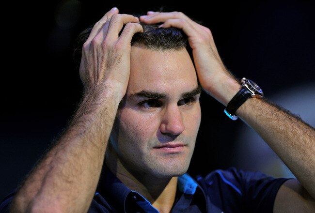 LONDON, ENGLAND - NOVEMBER 27:  Roger Federer of Switzerland reacts following his victory during the men's final singles match against Jo-Wilfried Tsonga of France during the Barclays ATP World Tour Finals at the O2 Arena on November 27, 2011 in London, England.  (Photo by Michael Regan/Getty Images for Barclays ATP Finals)