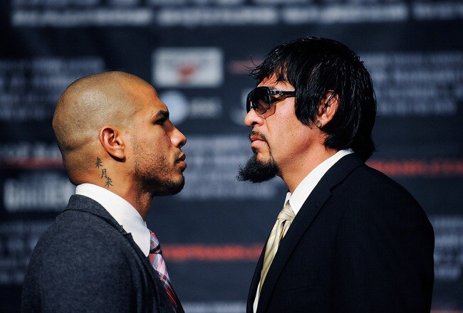NEW YORK, NY - SEPTEMBER 20:  Professional boxers Miguel Cotto (L) and Antonio Margarito pose for the media after a press conference at the Edison Ballroom on September 20, 2011 in New York City.  (Photo by Patrick McDermott/Getty Images)