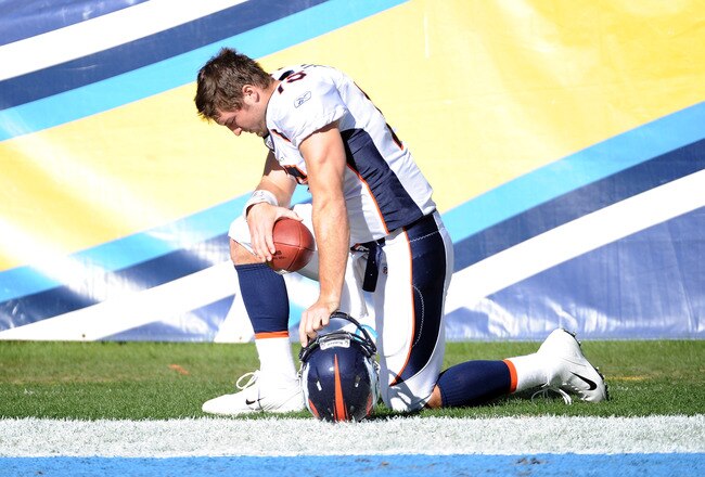 SAN DIEGO, CA - NOVEMBER 27:  Tim Tebow #15 of the Denver Broncos prays before the game against the San Diego Chargers at Qualcomm Stadium on November 27, 2011 in San Diego, California.  The Broncos went on to win 16-13 in overtime.  (Photo by Harry How/Getty Images)
