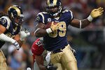 ST. LOUIS, MO - NOVEMBER 27:  Steven Jackson #39 of the St. Louis Rams rushes against the Arizona Cardinals at the Edward Jones Dome on November 27, 2011 in St. Louis, Missouri.  (Photo by Dilip Vishwanat/Getty Images)