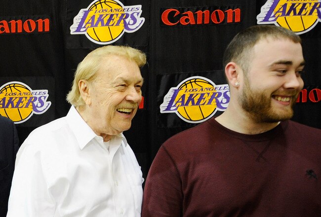 EL SEGUNDO, CA - MAY 31:  Mike Brown, (L) the new head coach for the Los Angeles Lakers, shares a laugh with owner Jerry Buss (C) and Buss' sons Jesse Buss after Brown's introductory news conference at the team's training facility on May 31, 2011 in El Segundo, California. Brown replaces Lakers coach Phil Jackson, who retired at the end of this season.  (Photo by Kevork Djansezian/Getty Images)