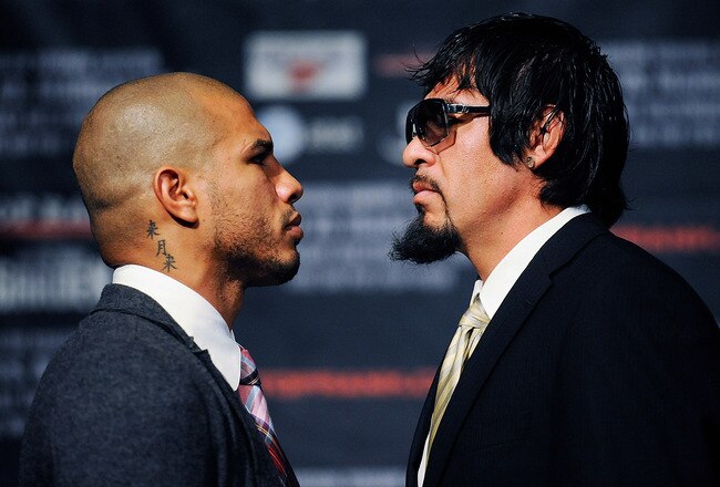 NEW YORK, NY - SEPTEMBER 20:  Professional boxers Miguel Cotto (L) and Antonio Margarito pose for the media after a press conference at the Edison Ballroom on September 20, 2011 in New York City.  (Photo by Patrick McDermott/Getty Images)