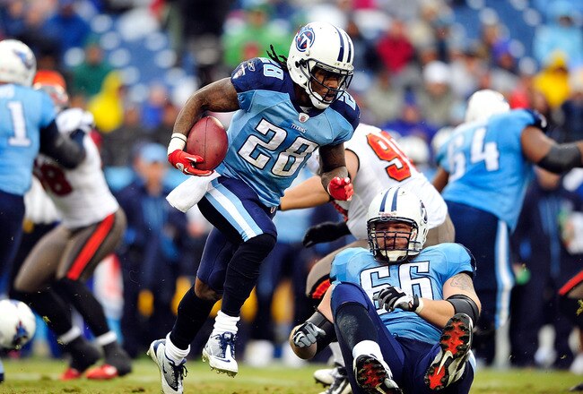 NASHVILLE, TN - NOVEMBER 27:  Chris Johnson #28 of the Tennessee Titans turns the corner against the Tampa Bay Buccaneers defense during play at LP Field on November 27, 2011 in Nashville, Tennessee.  (Photo by Grant Halverson/Getty Images)