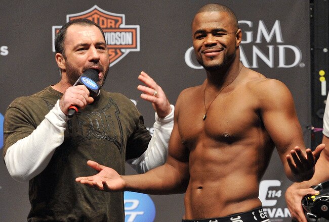 LAS VEGAS - MAY 28:  UFC fighter Rashad Evans (R) reacts to the crowd while speaking to UFC announcer Joe Rogan (L) about his fight against UFC fighter Quinton 'Rampage' Jackson at UFC 114: Rampage versus Rashad at the Mandalay Bay Hotel on May 28, 2010 in Las Vegas, Nevada.  (Photo by Jon Kopaloff/Getty Images)