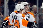ANAHEIM, CA - DECEMBER 02:  Danny Briere #48 and Claude Giroux #28 of the Philadelphia Flyers celebrate Giroux's game winning goal in overtime against the Anaheim Ducks at Honda Center on December 2, 2011 in Anaheim, California. The Flyers defeated the Ducks 4-3 in overtime.  (Photo by Jeff Gross/Getty Images)