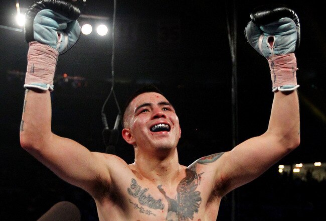 NEW YORK, NY - DECEMBER 03:  Brandon Rios of the United States celebrates after defeating John Murray (L) of Great Britain  by a TKO  during the WBA World Lightweight Title fight at Madison Square Garden on December 3, 2011 in New York City.  (Photo by Al Bello/Getty Images)