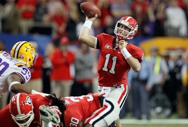 ATLANTA, GA - DECEMBER 03:  Quarterback Aaron Murray #11 of the Georgia Bulldogs throws a pass in the first quarter against the LSU Tigers during the 2011 SEC Conference Championship at  Georgia Dome on December 3, 2011 in Atlanta, Georgia.  (Photo by Kevin C. Cox/Getty Images)