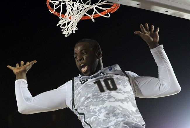 CORONADO, CA - NOVEMBER 11:  Draymond Green #10 of the Michigan State Spartans reacts after her dunk against the North Carolina Tar Heels during the Quicken Loans Carrier Classic on board the USS Carl Vinson on November 11, 2011 in Coronado, California.  (Photo by Harry How/Getty Images)