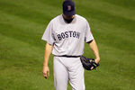 BALTIMORE, MD - SEPTEMBER 28: Relief pitcher Jonathan Papelbon #58 of the Boston Red Sox walks off the field after giving up the winning run in the ninth inning against the Baltimore Orioles at Oriole Park at Camden Yards on September 28, 2011 in Baltimore, Maryland. The Orioles defeated the Red Sox 4-3.  (Photo by Rob Carr/Getty Images)