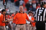 STILLWATER, OK - OCTOBER 29:  Head Coach Mike Gundy of the Oklahoma State Cowboys questions a call in the second half against the Baylor Bears on October 29, 2011 at Boone Pickens Stadium in Stillwater, Oklahoma.  Oklahoma State defeated Baylor 59-24.  (Photo by Brett Deering/Getty Images)