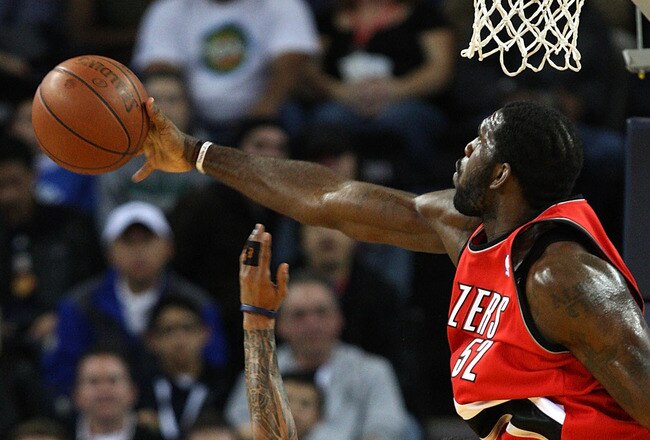 OAKLAND, CA - NOVEMBER 20:  Greg Oden #52 of the Portland Trail Blazers blocks a shot by Monta Ellis #8 of the Golden State Warriors during an NBA game at Oracle Arena on November 20, 2009 in Oakland, California.  (Photo by Jed Jacobsohn/Getty Images)