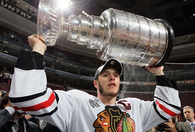 PHILADELPHIA - JUNE 09:  Jonathan Toews #19 of the Chicago Blackhawks hoists the Stanley Cup after teammate Patrick Kane scored the game-winning goal in overtime to defeat the Philadelphia Flyers 4-3 and win the Stanley Cup in Game Six of the 2010 NHL Stanley Cup Final at the Wachovia Center on June 9, 2010 in Philadelphia, Pennsylvania.  (Photo by Jim McIsaac/Getty Images)