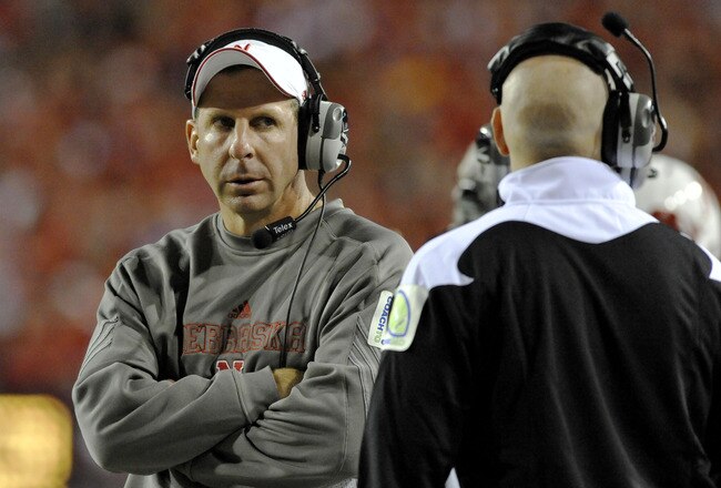 LINCOLN, NE - SEPTEMBER 25: Coach Bo Pelini of the Nebraska Cornuskers eyes his defensive coaching slaff during second half action of their game against the South Dakota State Jackrabbits at Memorial Stadium on September 25, 2010 in Lincoln, Nebraska. Nebraska Defeated South Dakota State 17-3. (Photo by Eric Francis/Getty Images)