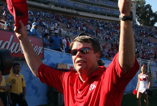 PASADENA, CA - SEPTEMBER 27:  Head coach Pat Hill of the Frenso State Bulldogs celebrates after defearing the UCLA Bruins on September 27, 2008 at the Rose Bowl in Pasadena, California.  (Photo by Stephen Dunn/Getty Images)