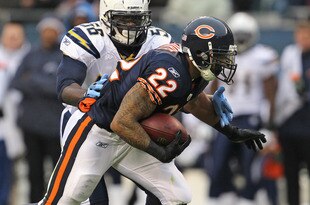 CHICAGO, IL - NOVEMBER 20:  Matt Forte #22 of the Chicago Bears is hit by Donald Butler #56 of the San Diego Chargers at Soldier Field on November 20, 2011 in Chicago, Illinois. The Bears defeated the Chargers 31-20.  (Photo by Jonathan Daniel/Getty Images)