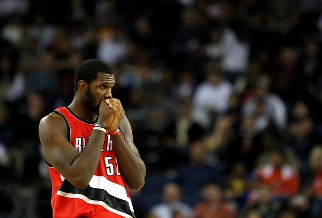 OAKLAND, CA - NOVEMBER 20:  Greg Oden #52 of the Portland Trail Blazers looks on against the Golden State Warriors during an NBA game at Oracle Arena on November 20, 2009 in Oakland, California.  (Photo by Jed Jacobsohn/Getty Images)