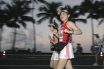 HONOLULU - DECEMBER 11:  With Waikiki Beach in the background, Junko Moriyuki, of Kitakyuusyuu-Shi Japan, participates in the 2005 Honolulu Marathon on December 11, 2005 in Honolulu, Hawaii.  (Photo by Marco Garcia/Getty Images)