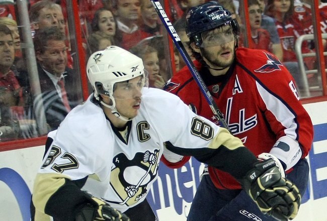 WASHINGTON - MAY 13:  Alex Ovechkin #8 of the Washington Capitals skates against Sidney Crosby #87 of the Pittsburgh Penguins during Game Seven of the Eastern Conference Semifinal  Round of the 2009 Stanley Cup Playoffs at Verizon Center on May 13, 2009 in Washington, DC.The Penguins defeated the Capitals 6-2 to move into the semifinals.  (Photo by Bruce Bennett/Getty Images)