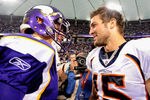 MINNEAPOLIS, MN - DECEMBER 4: Christian Ponder #7 of the Minnesota Vikings and Tim Tebow #15 of the Denver Broncos speak after their game on December 4, 2011 at Mall of America Field at the Hubert H. Humphrey Metrodome in Minneapolis, Minnesota. The Broncos defeated the Vikings 35-32. (Photo by Hannah Foslien/Getty Images)