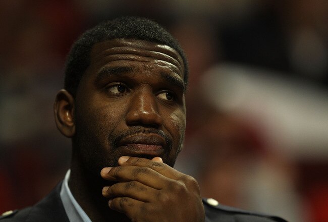 CHICAGO - NOVEMBER 01: Greg Oden #52 of the Portland Trail Blazers watches from the bench as his teammates take on the Chicago Bulls at the United Center on November 1, 2010 in Chicago, Illinois. The Bulls defeated the Trail Blazers 110-98. NOTE TO USER: User expressly acknowledges and agrees that, by downloading and/or using this Photograph, User is consenting to the terms and conditions of the Getty Images License Agreement. (Photo by Jonathan Daniel/Getty Images)