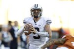 AUSTIN, TX - SEPTEMBER 10:  Quarterback Jake Heaps #9 of the BYU Cougars drops back to pass against the Texas Longhorns on September 10, 2011 at Darrell K. Royal-Texas Memorial Stadium in Austin, Texas.  Texas defeated BYU 17-16. (Photo by Erich Schlegel/Getty Images)