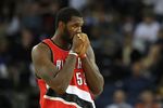 OAKLAND, CA - NOVEMBER 20:  Greg Oden #52 of the Portland Trail Blazers looks on against the Golden State Warriors during an NBA game at Oracle Arena on November 20, 2009 in Oakland, California.  (Photo by Jed Jacobsohn/Getty Images)