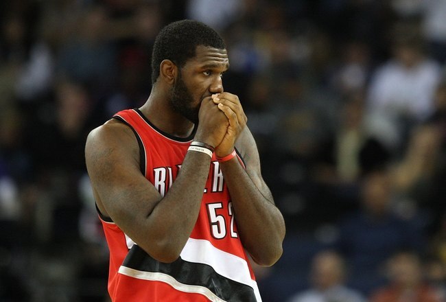 OAKLAND, CA - NOVEMBER 20:  Greg Oden #52 of the Portland Trail Blazers looks on against the Golden State Warriors during an NBA game at Oracle Arena on November 20, 2009 in Oakland, California.  (Photo by Jed Jacobsohn/Getty Images)