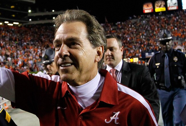 AUBURN, AL - NOVEMBER 26:  Head coach Nick Saban of the Alabama Crimson Tide celebrates their 42-14 win over the Auburn Tigers at Jordan-Hare Stadium on November 26, 2011 in Auburn, Alabama.  (Photo by Kevin C. Cox/Getty Images)