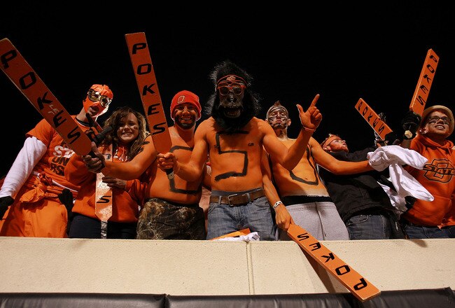 STILLWATER, OK - DECEMBER 03:  Fans cheer before a game between the Oklahoma Sooners and the Oklahoma State Cowboys at Boone Pickens Stadium on December 3, 2011 in Stillwater, Oklahoma.  (Photo by Ronald Martinez/Getty Images)