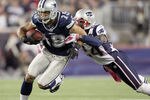 FOXBORO, MA - OCTOBER 16:  Miles Austin #19 of the Dallas Cowboys carries the ball as  Kyle Arrington #24 of the New England Patriots defends on October 16, 2011 at Gillette Stadium in Foxboro, Massachusetts. The New England Patriots defeated the Dallas Cowboys 20-16.  (Photo by Elsa/Getty Images)