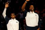PHOENIX - FEBRUARY 15:  (L-R) Chris Paul, Dwight Howard and Dwyane Wade, members of the men's gold medal winning USA Olympic basketball teams, wave to the crowd during half time of the 58th NBA All-Star Game, part of 2009 NBA All-Star Weekend at US Airways Center on February 15, 2009 in Phoenix, Arizona.  NOTE TO USER: User expressly acknowledges and agrees that, by downloading and or using this photograph, User is consenting to the terms and conditions of the Getty Images License Agreement.  (Photo by Ronald Martinez/Getty Images)