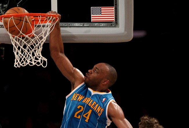 LOS ANGELES, CA - APRIL 17:  Carl Landry #24 of  the New Orleans Hornets dunks over Pau Gasol #16 of the Los Angeles Lakers in Game One of the Western Conference Quarterfinals in the 2011 NBA Playoffs on April 17, 2011 at Staples Center in Los Angeles, California. The Hornets won 109-100.  NOTE TO USER: User expressly acknowledges and agrees that, by downloading and or using this photograph, User is consenting to the terms and conditions of the Getty Images License Agreement.  (Photo by Stephen Dunn/Getty Images)