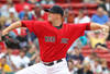 BOSTON - AUGUST 16:  Jon Lester #31 of the Boston Red Sox throws against the Tampa Bay Rays at Fenway Park on August 16, 2011 in Boston, Massachusetts.  (Photo by Jim Rogash/Getty Images)