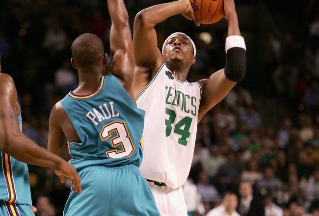 BOSTON - NOVEMBER 1:  Paul Pierce #34 of the Boston Celtics shoots over Chris Paul #3 of the New Orleans/Oklahoma City Hornets during the game on November 1, 2006 at the TD Banknorth Garden in Boston, Massachusetts. The Hornets won 91-87. NOTE TO USER: User expressly acknowledges and agrees that, by downloading and or using this photograph, User is consenting to the terms and conditions of the Getty Images License Agreement.  (Photo by Elsa/Getty Images)