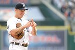 DETROIT, MI - OCTOBER 12:  Brandon Inge #15 of the Detroit Tigers signals prior to Game Four of the American League Championship Series against the Texas Rangers at Comerica Park on October 12, 2011 in Detroit, Michigan.  (Photo by Harry How/Getty Images)