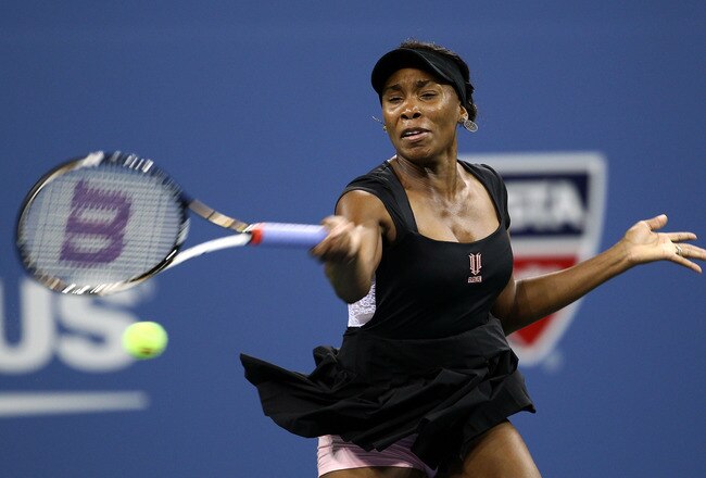NEW YORK, NY - AUGUST 29:  Venus Williams of the United States returns the ball against Vesna Dolonts of Russia during Day One of the 2011 US Open at the USTA Billie Jean King National Tennis Center on August 29, 2011 in the Flushing neighborhood of the Queens borough of New York City.  (Photo by Julian Finney/Getty Images)