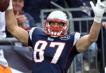 FOXBORO, MA - DECEMBER 04:   Rob Gronkowski #87 of the New England Patriots scores a touchdown in the third quarter against the Indianapolis Colts on December 4, 2011 at Gillette Stadium in Foxboro, Massachusetts.  (Photo by Elsa/Getty Images)
