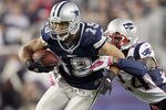 FOXBORO, MA - OCTOBER 16:  Miles Austin #19 of the Dallas Cowboys carries the ball as  Kyle Arrington #24 of the New England Patriots defends on October 16, 2011 at Gillette Stadium in Foxboro, Massachusetts. The New England Patriots defeated the Dallas Cowboys 20-16.  (Photo by Elsa/Getty Images)