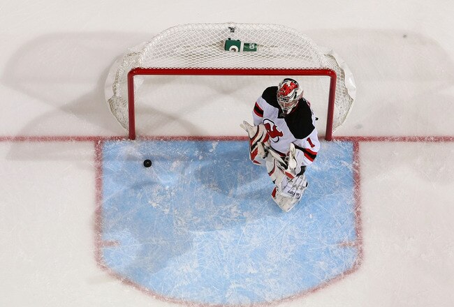 GLENDALE, AZ - OCTOBER 27:  Goaltender Johan Hedberg #1 of the New Jersey Devils reacts after allowing a goal during the NHL game against the Phoenix Coyotes at Jobing.com Arena on October 27, 2011 in Glendale, Arizona. The Coyotes defeated the Devils 5-3.  (Photo by Christian Petersen/Getty Images)